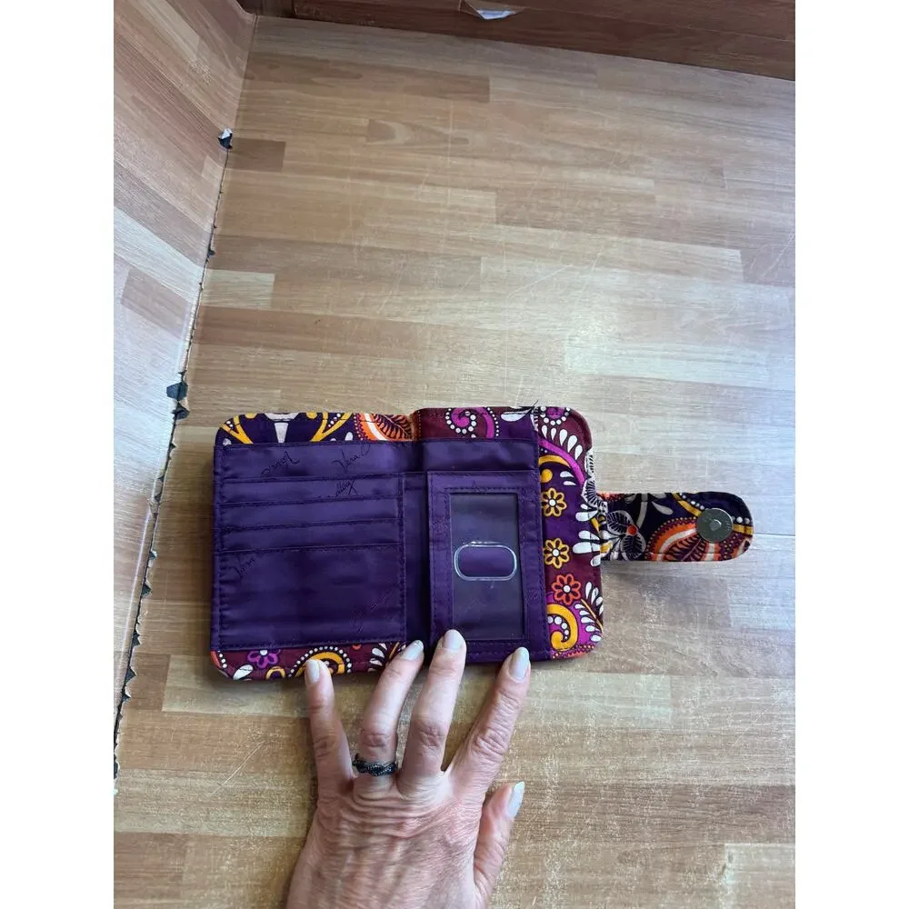 Vera Bradley Turnlock Wallet in the retired Safari Sunset pattern.